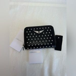 Zadig & Voltaire black wallet.